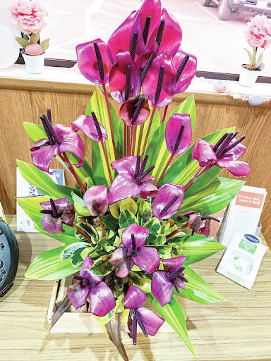 a vase of flowers on a table