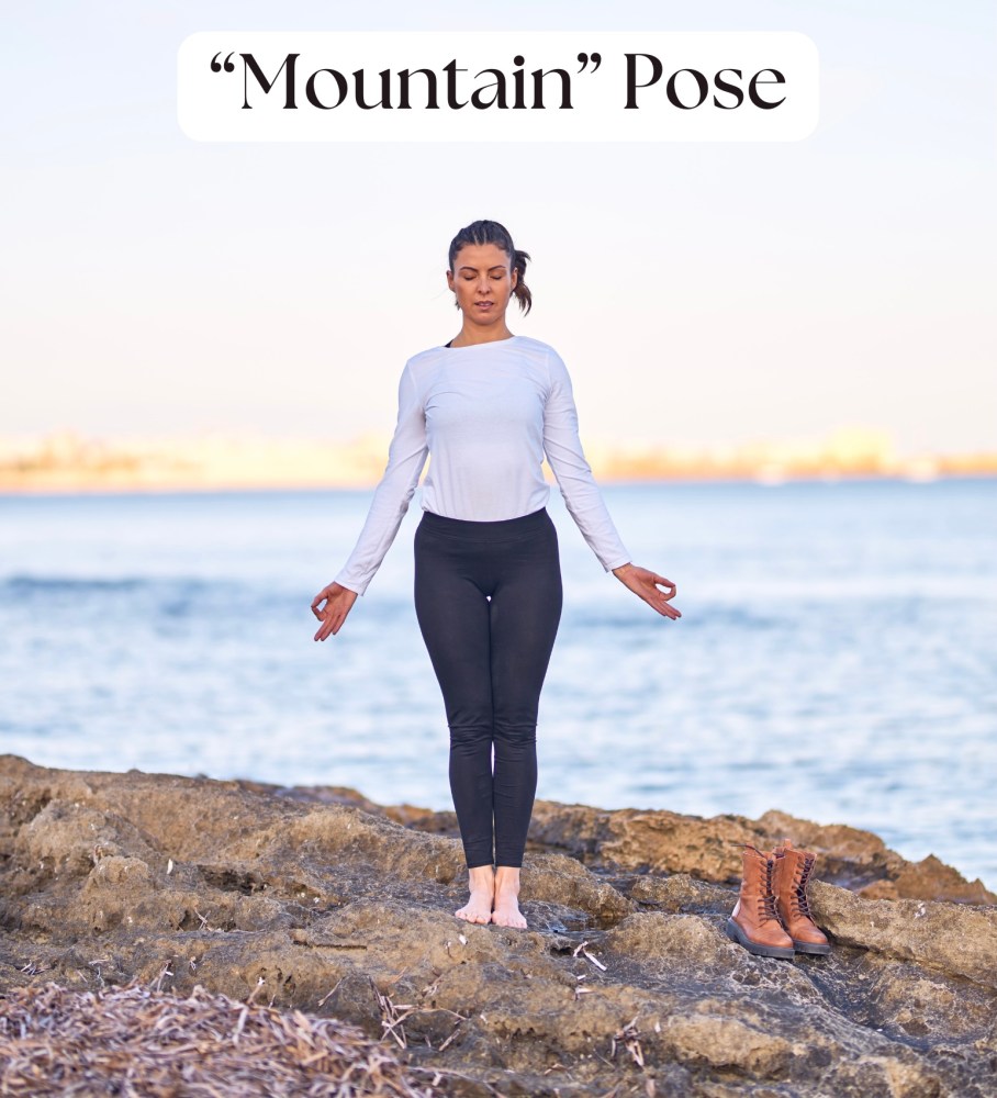 a person standing next to a body of water
