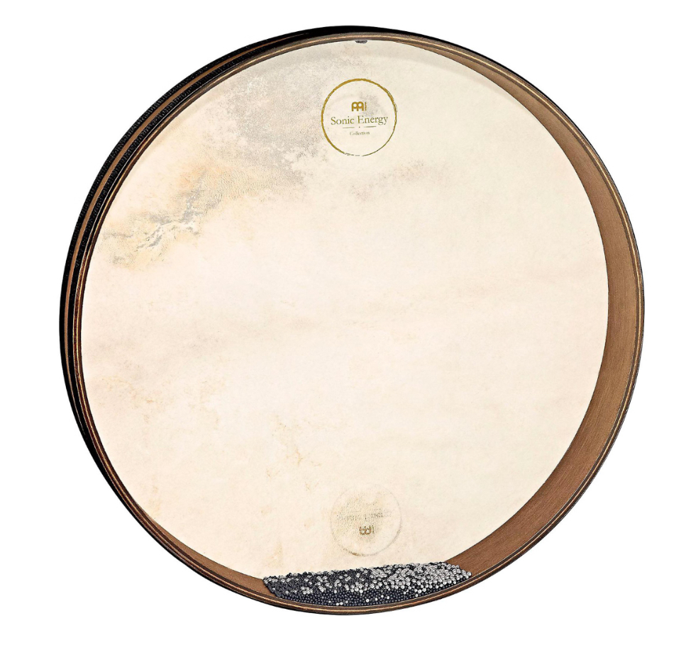 A round frame drum with a light skin surface and dark edge, featuring small beads inside.