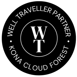 Black circular logo with 'Well Traveller Partner' and 'Kona Cloud Forest' text.